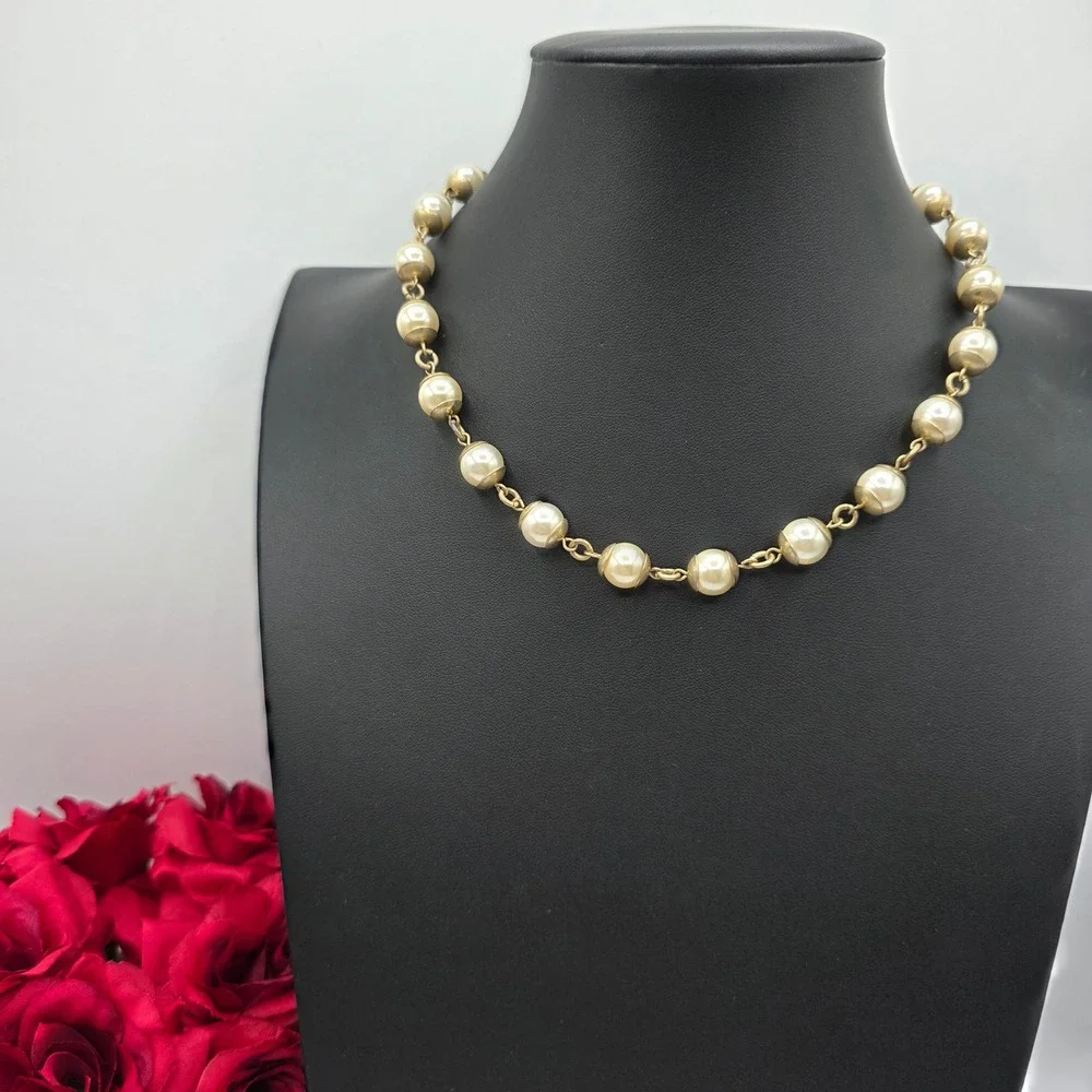 Anne Klein Gold Tone Faux Pearl Bead Cap Link Necklace with Lion Logo Charm